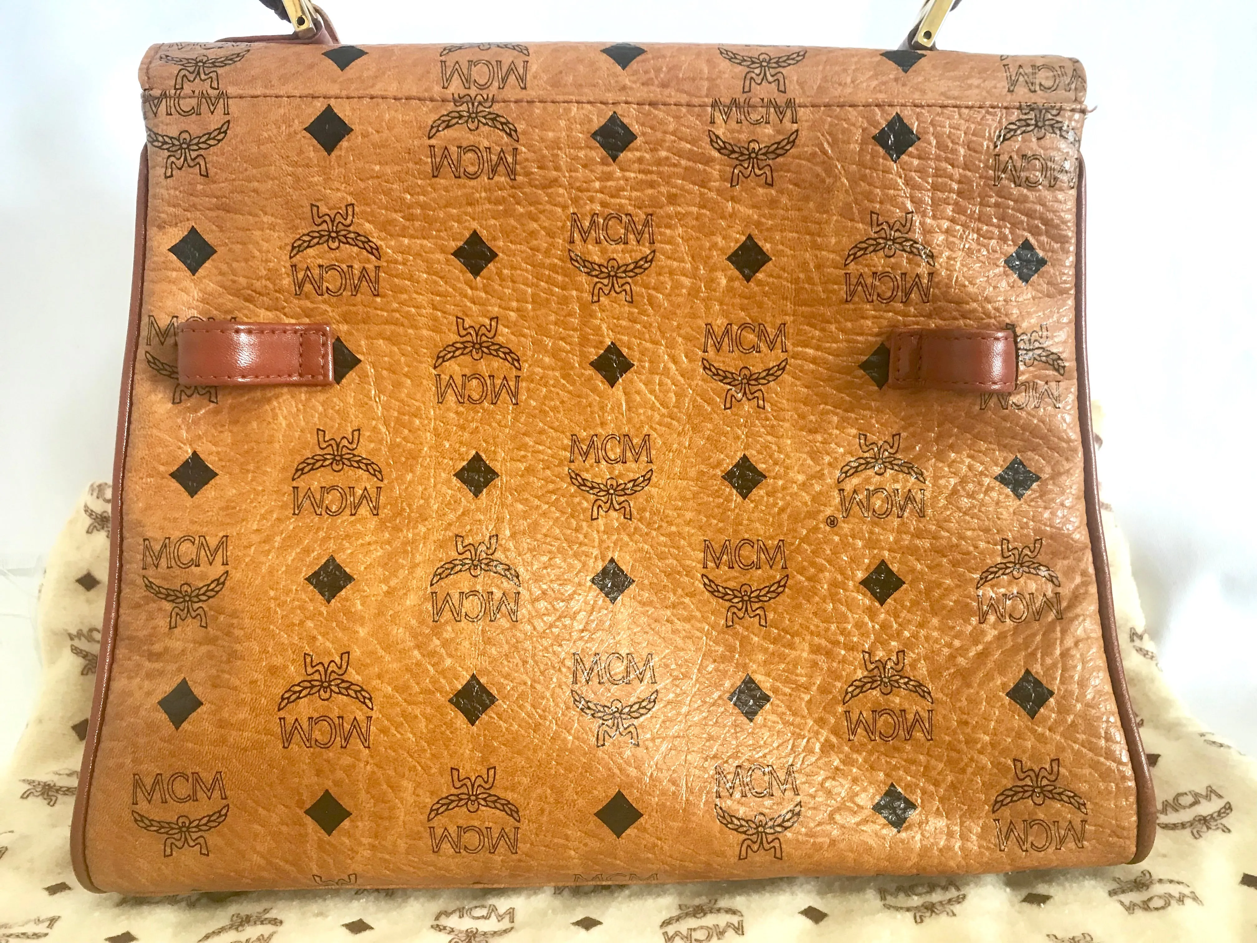 Vintage MCM classic brown monogram Kelly bag with golden logo plate. Perfect daily use bag.  By Michael Cromber, Germany