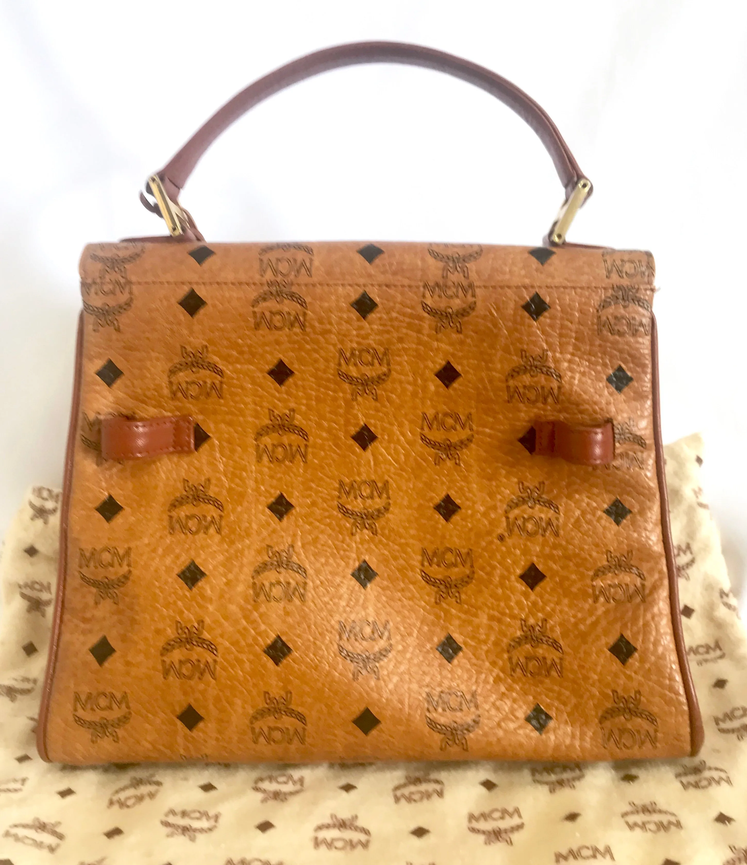 Vintage MCM classic brown monogram Kelly bag with golden logo plate. Perfect daily use bag.  By Michael Cromber, Germany