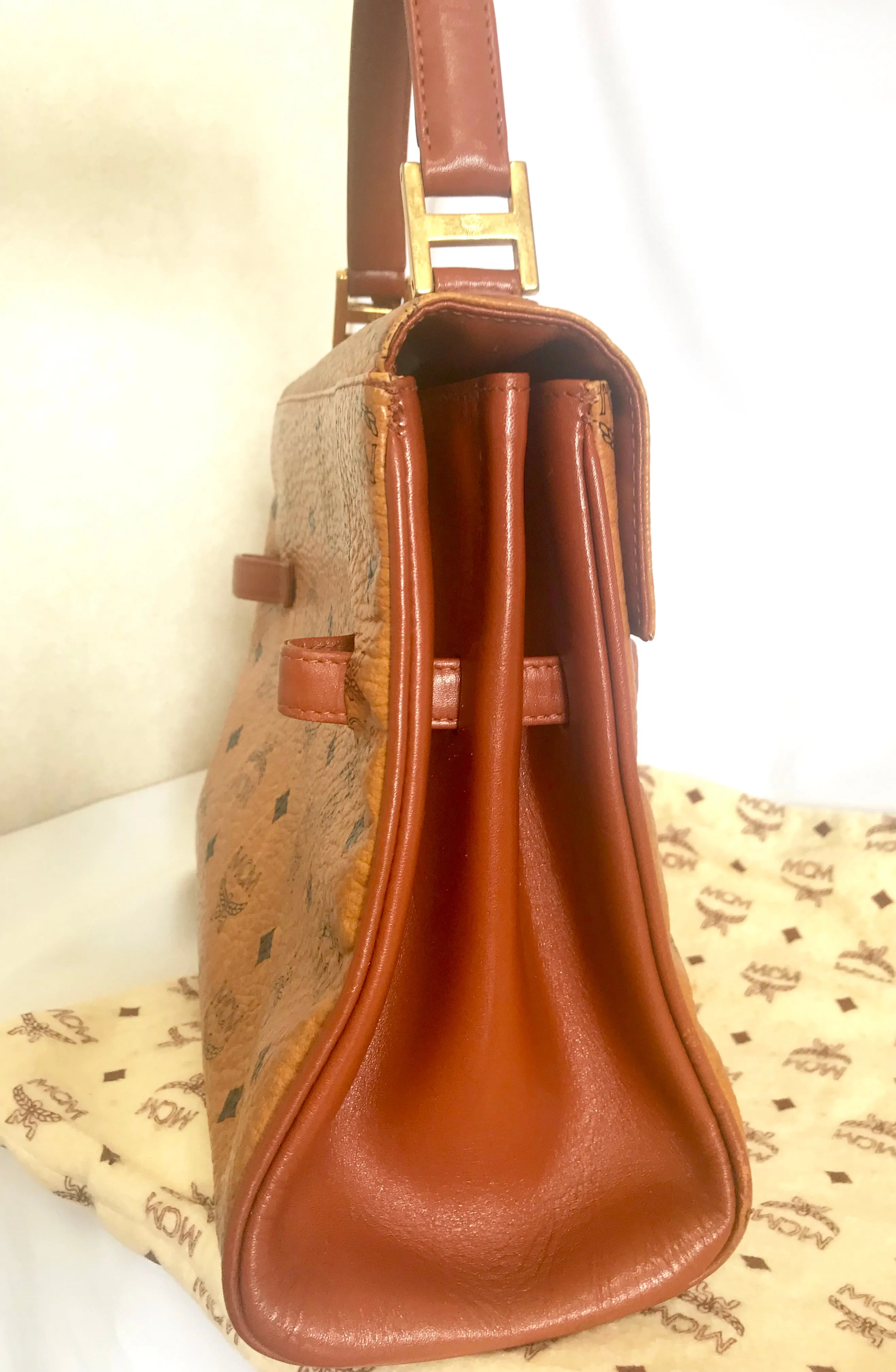 Vintage MCM classic brown monogram Kelly bag with golden logo plate. Perfect daily use bag.  By Michael Cromber, Germany
