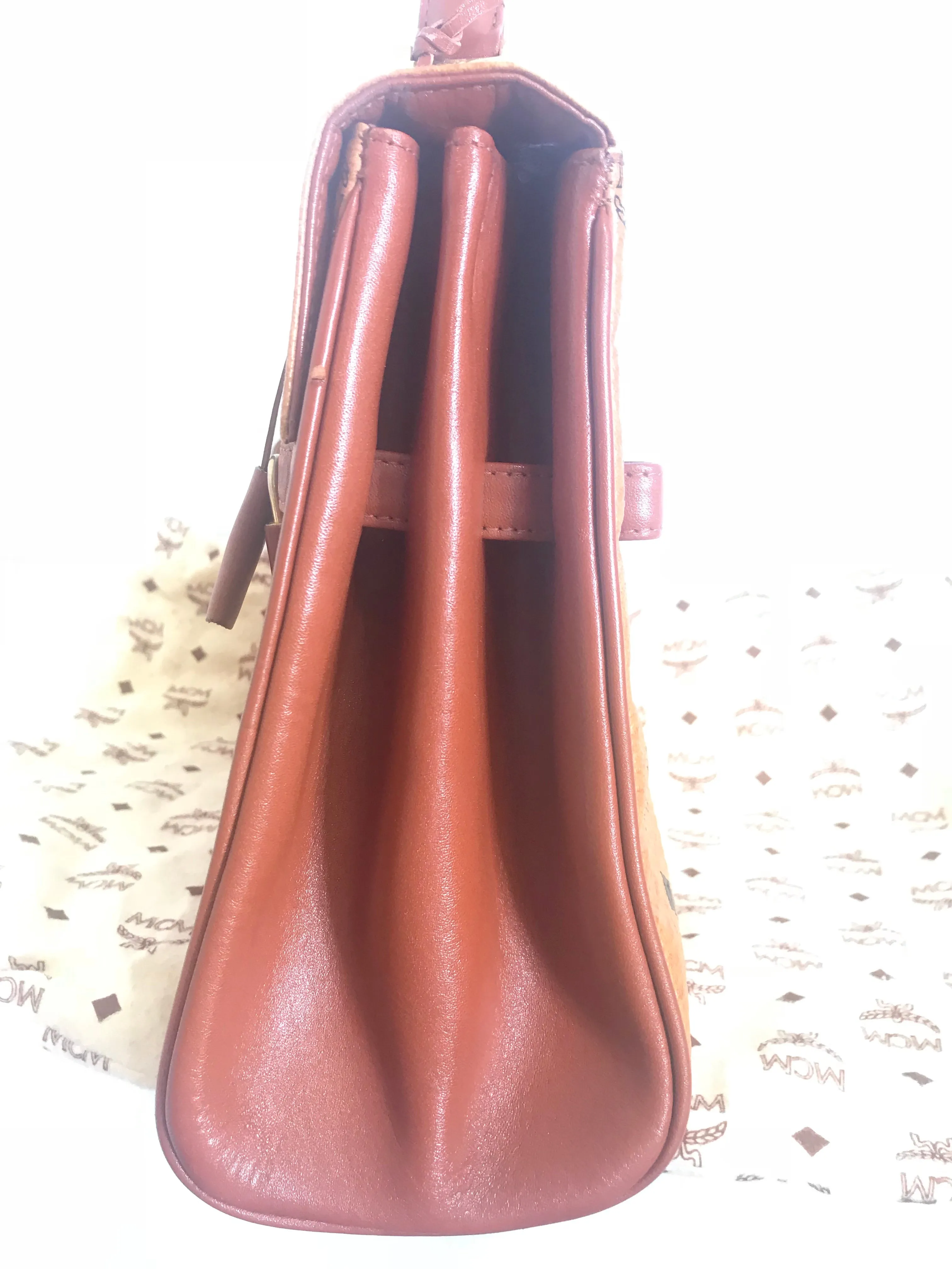 Vintage MCM classic brown monogram Kelly bag with golden logo plate. Perfect daily use bag.  By Michael Cromber, Germany
