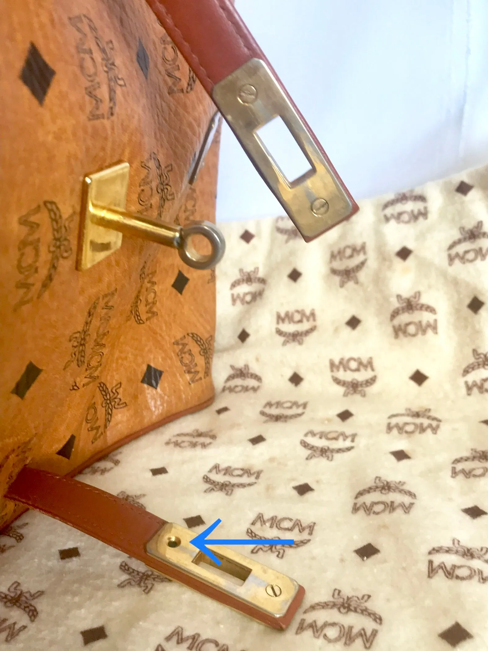 Vintage MCM classic brown monogram Kelly bag with golden logo plate. Perfect daily use bag.  By Michael Cromber, Germany
