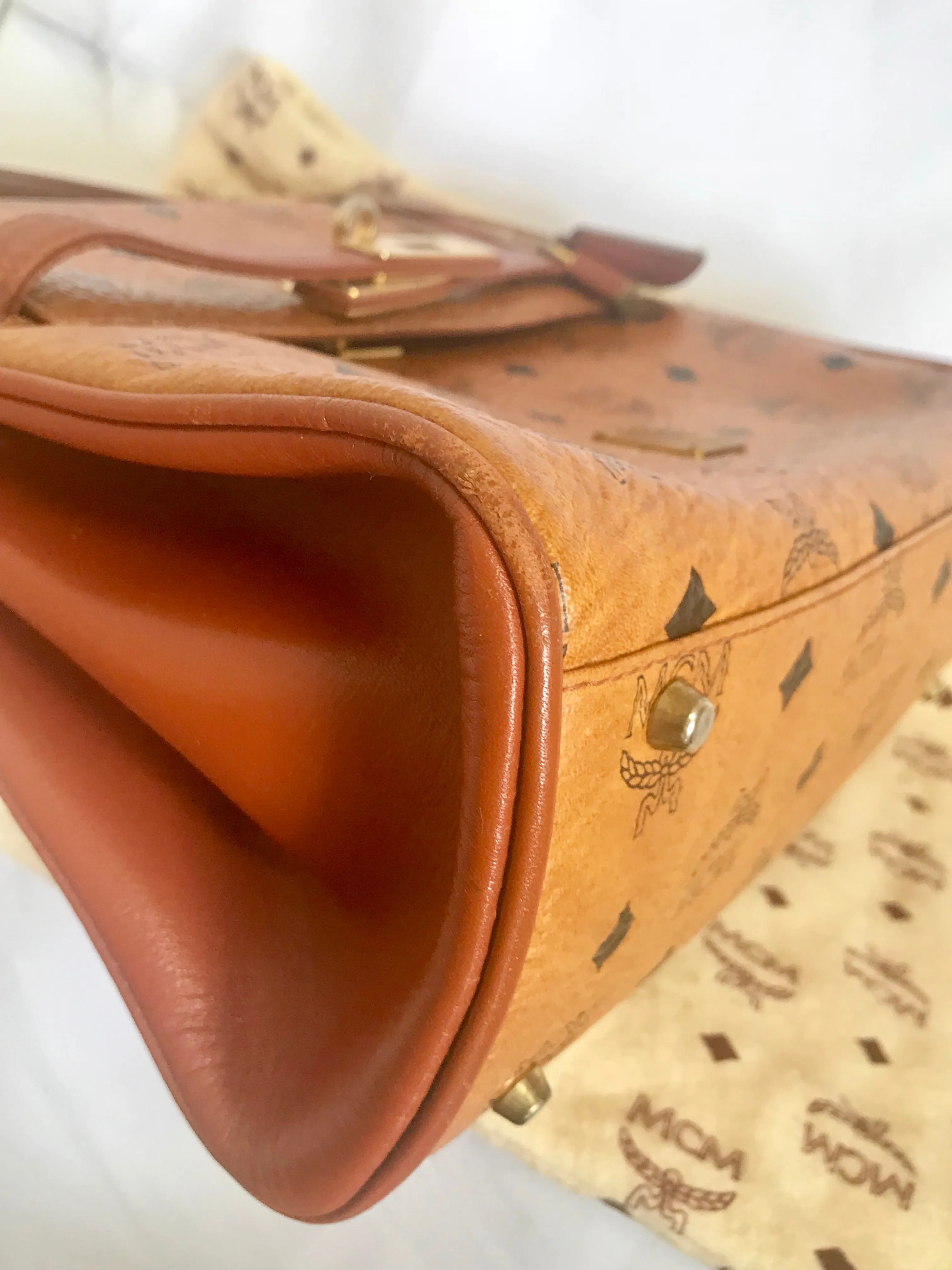 Vintage MCM classic brown monogram Kelly bag with golden logo plate. Perfect daily use bag.  By Michael Cromber, Germany