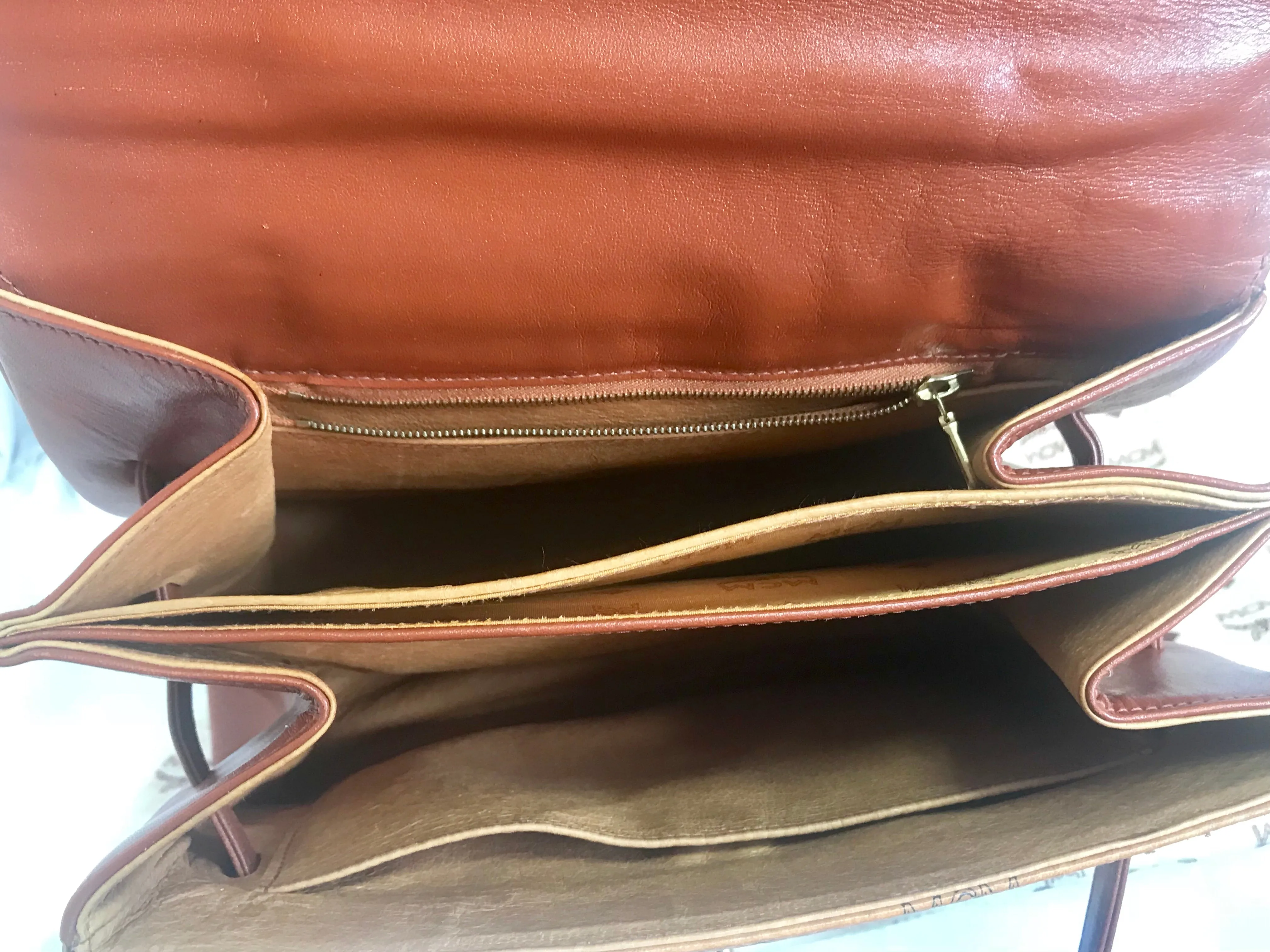 Vintage MCM classic brown monogram Kelly bag with golden logo plate. Perfect daily use bag.  By Michael Cromber, Germany