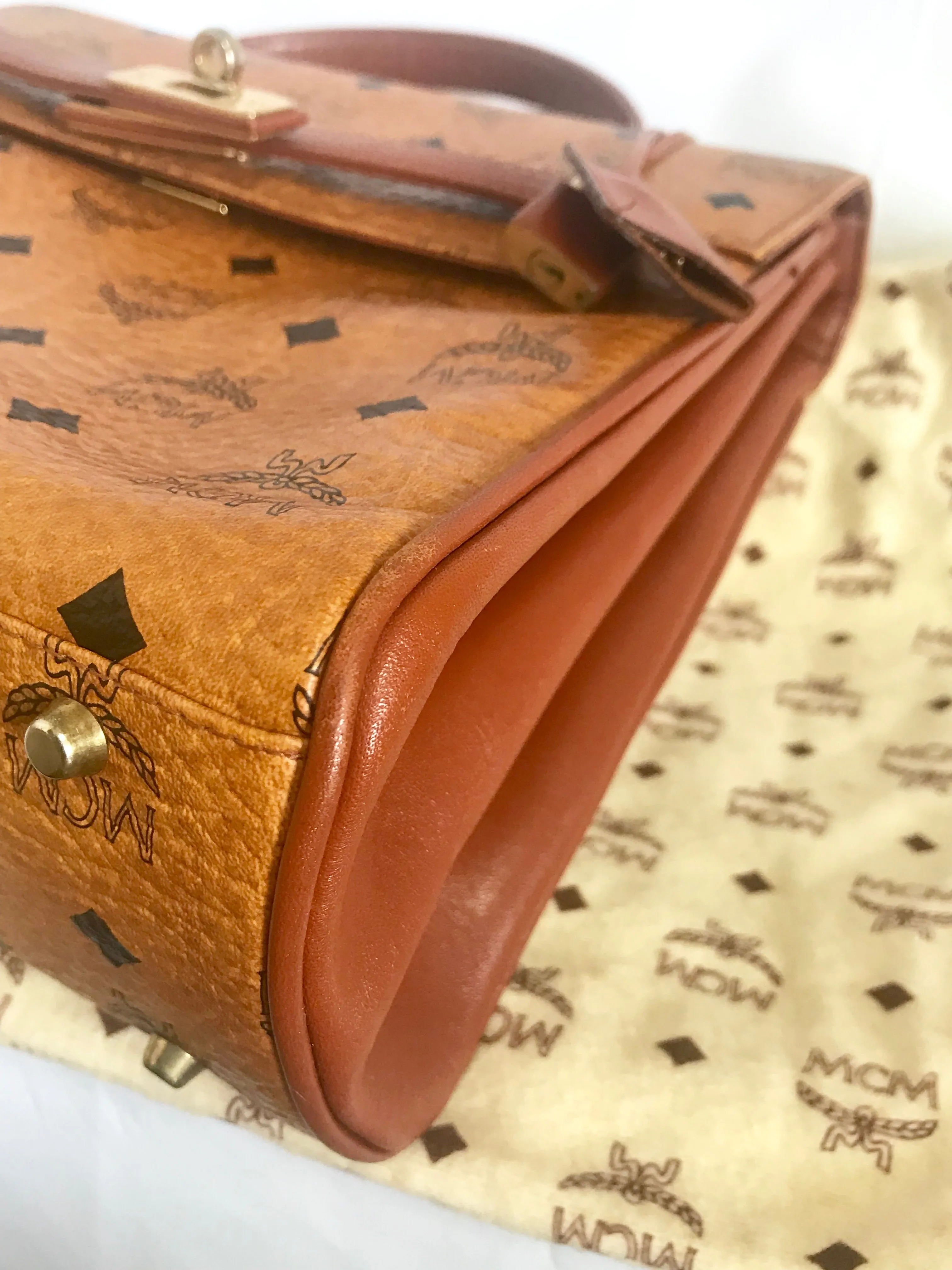 Vintage MCM classic brown monogram Kelly bag with golden logo plate. Perfect daily use bag.  By Michael Cromber, Germany